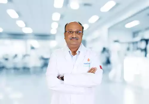 Dr Tejas K S